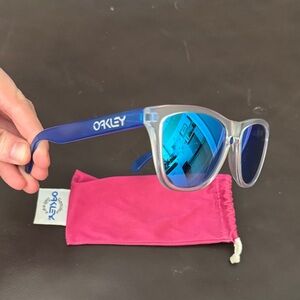 Oakley Frogskin Matte Clear with Blue Legs and Blue Iridium Lenses.